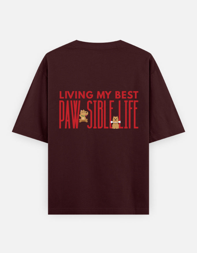 Paw-Sible Life oversized t-shirt back design — Living My Best Paw-Sible Life — Maroon unisex cotton tee | StyleUp.Today