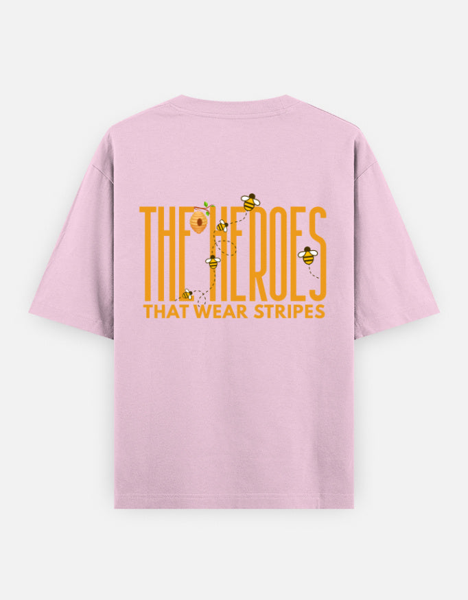 'Bee' A Hero oversized t-shirt back design — The Heroes That Wear Stripes — Light Baby Pink unisex cotton tee | StyleUp.Today