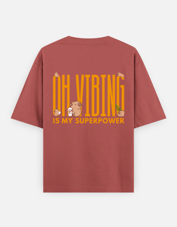 Capy-Zen-Bara oversized t-shirt back design — Oh Vibing Is My Superpower — Coral unisex cotton tee | StyleUp.Today