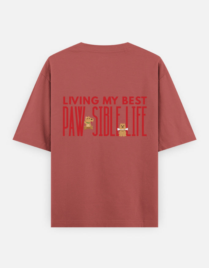 Paw-Sible Life oversized t-shirt back design — Living My Best Paw-Sible Life — Coral unisex cotton tee | StyleUp.Today
