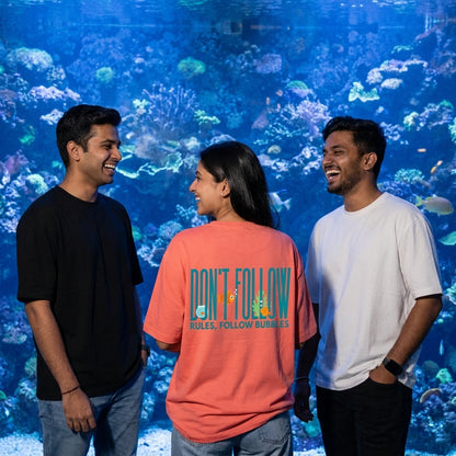 Follow Bubbles oversized graphic tee worn in an Indian street-style setting — Coral streetwear India | StyleUp.Today
